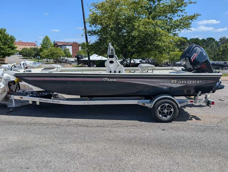 Slide: The Image of 2024 Ranger RB190 boat on trailer, parked outdoors, sunny day. - 1