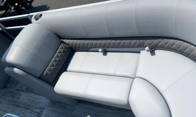 Slide: The Image of Luxurious seating on 2024 Ranger Reata 223C boat with quilted upholstery. - 15