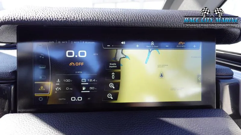 Slide: The Image of 2025 Nautique Super Air Nautique GS22 dashboard with navigation and control display. - 24