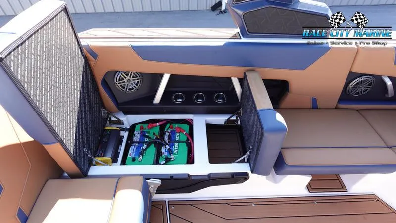 Slide: The Image of 2025 Nautique Super Air Nautique GS22 interior storage and seating detail. - 29