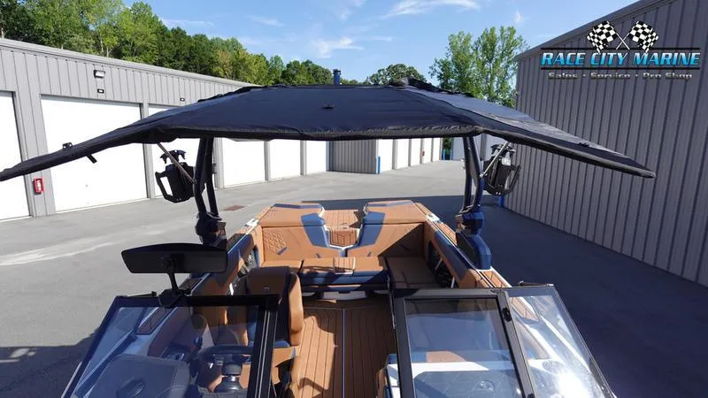 Slide: The Image of 2025 Nautique Super Air Nautique GS22 boat with canopy at Race City Marine. - 32