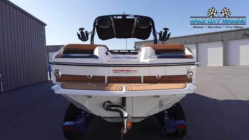 Slide: The Image of 2025 Nautique Super Air Nautique GS22 boat rear view at Race City Marine. - 5