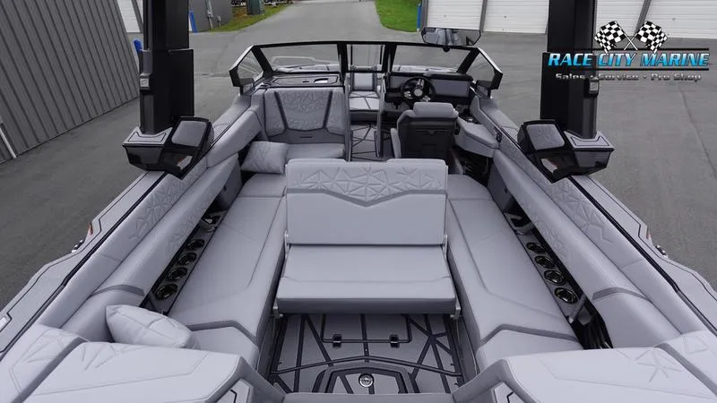 Slide: The Image of 2025 Nautique Super Air Nautique G25 Paragon interior with luxurious seating and modern design. - 12