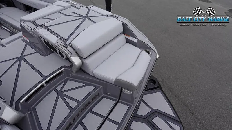 Slide: The Image of 2025 Nautique Super Air Nautique G25 Paragon boat with sleek gray seating and deck design. - 18