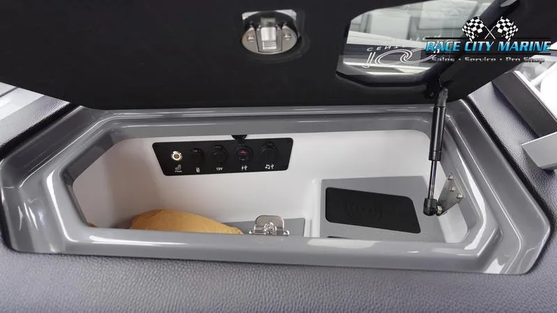 Slide: The Image of Storage compartment in 2025 Nautique Super Air Nautique G25 Paragon boat. - 26