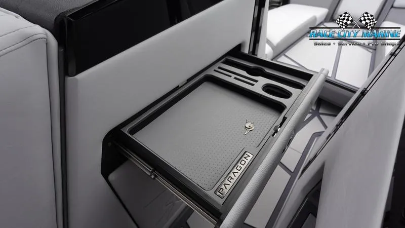 Slide: The Image of 2025 Nautique Super Air Nautique G25 Paragon interior storage compartment detail. - 29