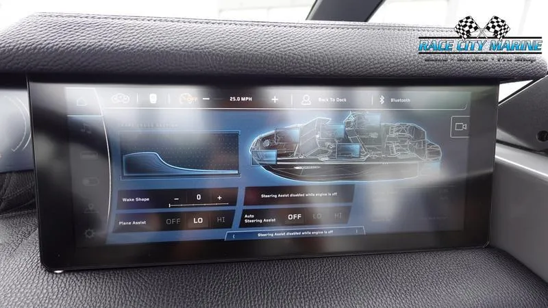 Slide: The Image of 2025 Nautique Super Air Nautique G25 Paragon dashboard display with advanced controls. - 34