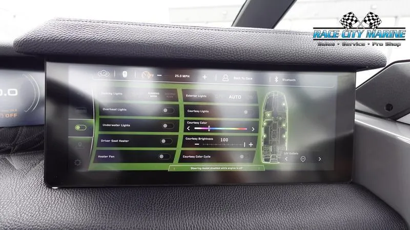 Slide: The Image of 2025 Nautique Super Air Nautique G25 Paragon dashboard display with control settings. - 35