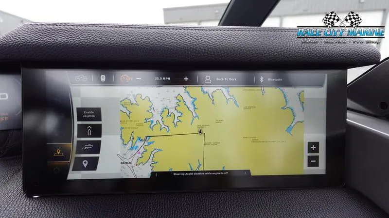 Slide: The Image of 2025 Nautique Super Air Nautique G25 Paragon navigation display showing a detailed map. - 37