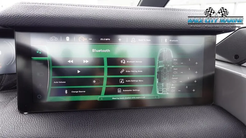 Slide: The Image of 2025 Nautique Super Air Nautique G25 Paragon touchscreen display with Bluetooth controls. - 38