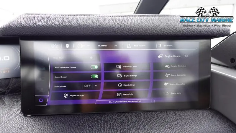 Slide: The Image of 2025 Nautique Super Air Nautique G25 Paragon dashboard display with control settings. - 40