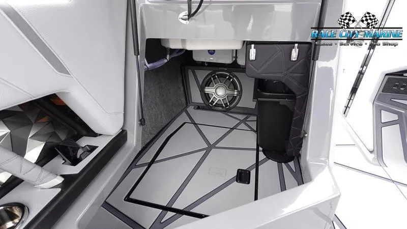 Slide: The Image of 2025 Nautique Super Air Nautique G25 Paragon interior with sleek design and advanced audio system. - 42