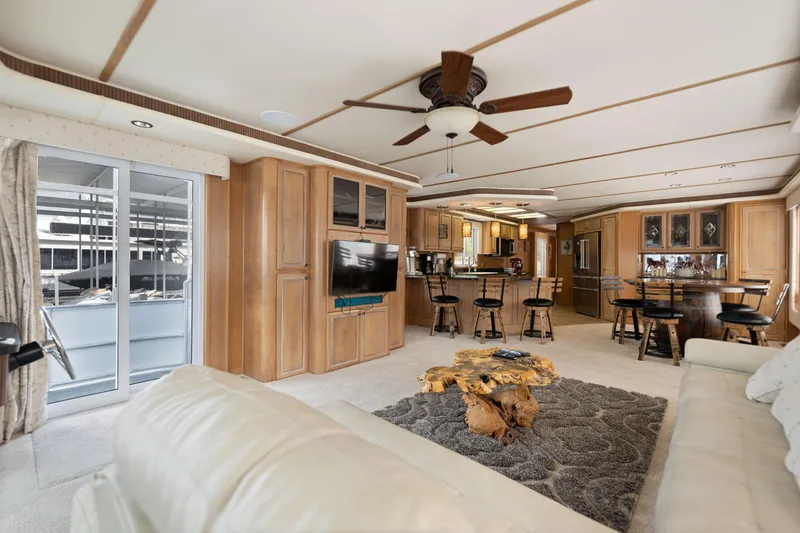 Slide: The Image of Luxurious 2001 Stardust Cruisers houseboat interior with modern furnishings and open living space. - 29