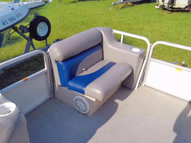 Slide: The Image of 2006 Odyssey Pontoons 218 DLX boat seating with blue and gray upholstery. - 7