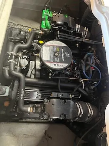 Slide: The Image of 2009 Glastron GT205 engine compartment with MerCruiser 5.0L motor. - 4
