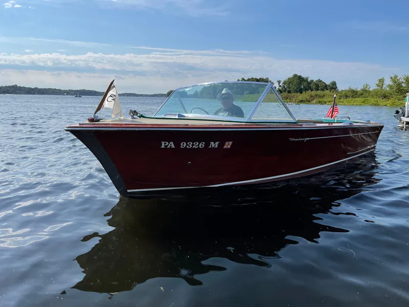 The Image of 1966 Century Resorter boat on a lake, displaying registration PA 9326 M. - 0