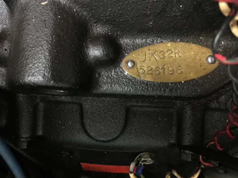 Slide: The Image of 1966 Century Resorter engine detail with serial number plate. - 4