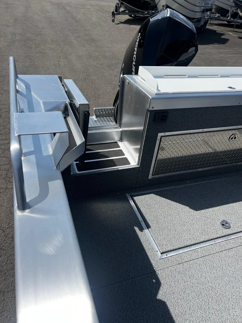 Slide: The Image of 2024 Thunder Jet 24 Alexis Pro boat deck with sleek aluminum finish. - 13