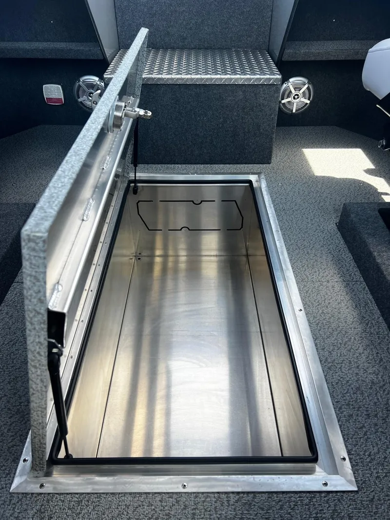 Slide: The Image of 2024 Thunder Jet 24 Alexis Pro boat storage compartment with open hatch. - 31