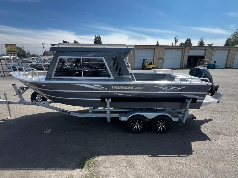 Slide: The Image of 2024 Thunder Jet 24 Alexis Pro boat on trailer in parking lot. - 4