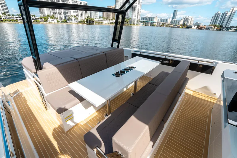 Slide: The Image of Luxurious 2025 De Antonio Yachts D32 OPEN with spacious seating and scenic waterfront view. - 21