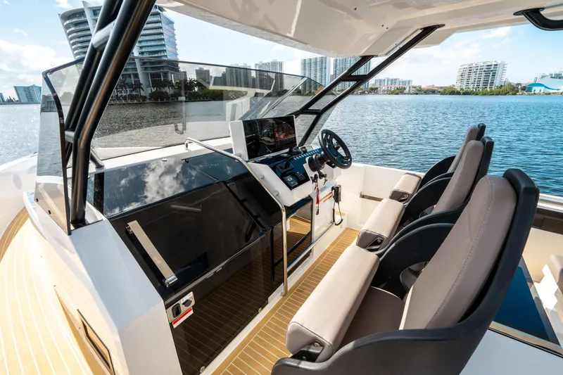 Slide: The Image of Interior of 2025 De Antonio Yachts D32 OPEN, featuring sleek design and modern controls. - 28