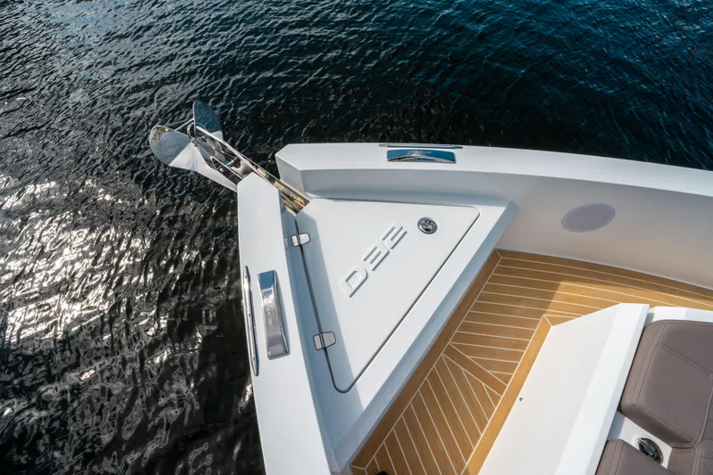 Slide: The Image of De Antonio Yachts D32 OPEN 2025 bow with sleek design on calm water. - 37