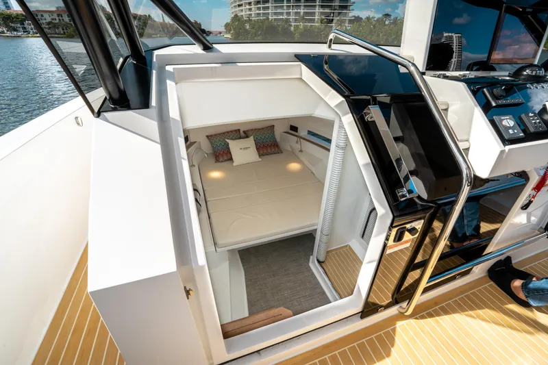 Slide: The Image of 2025 De Antonio Yachts D32 OPEN cabin interior with modern design and comfortable bedding. - 42