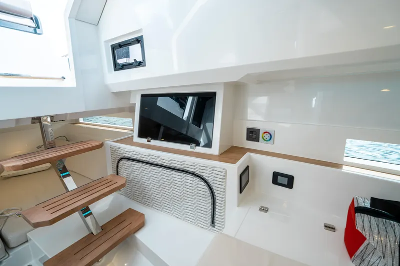 Slide: The Image of Interior of 2025 De Antonio Yachts D32 OPEN, featuring modern design and wooden accents. - 44
