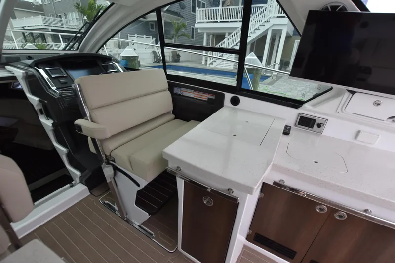 Slide: The Image of Interior of 2017 Monterey 360 Sport Coupe with seating and modern amenities. - 22
