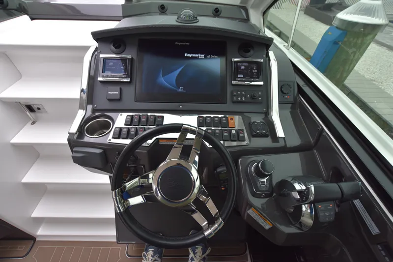 Slide: The Image of 2017 Monterey 360 Sport Coupe dashboard with advanced navigation and control systems. - 48