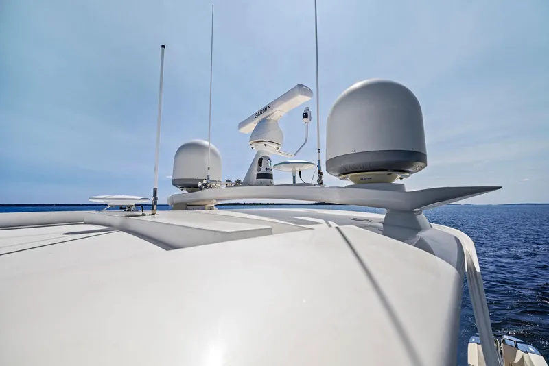 Slide: The Image of Riviera Sport Yacht 2017 radar and antennas on open sea. - 14
