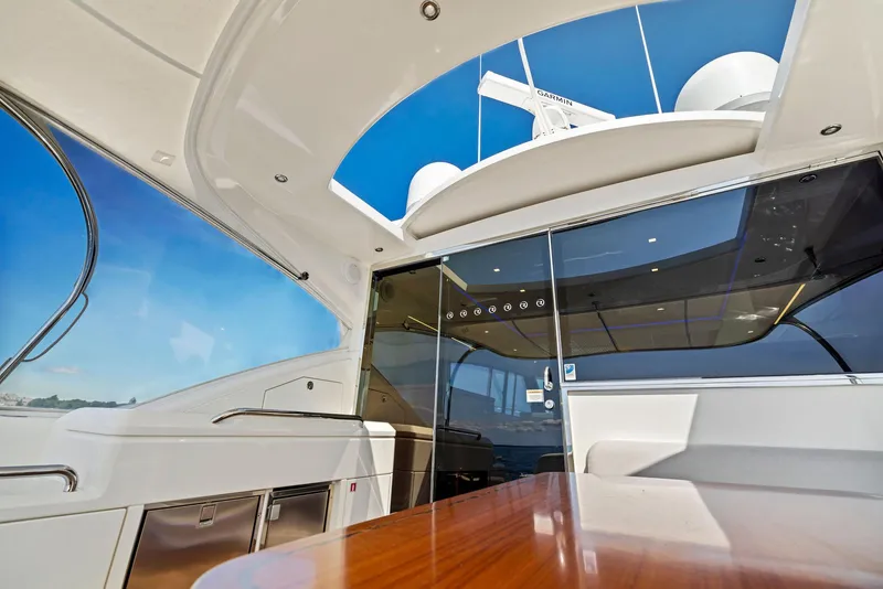 Slide: The Image of Interior view of 2017 Riviera Sport Yacht with sleek design and modern amenities. - 16