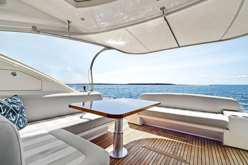 Slide: The Image of Luxurious 2017 Riviera Sport Yacht interior with ocean view and elegant seating. - 21