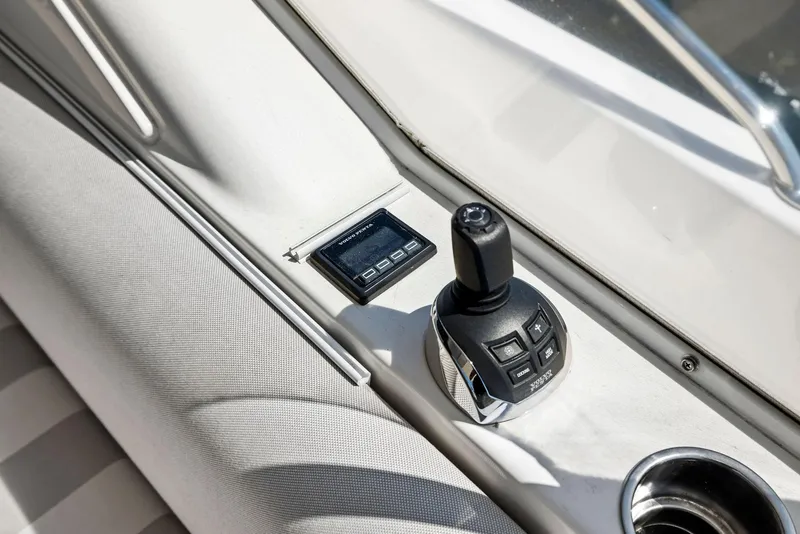 Slide: The Image of Control panel of 2017 Riviera Sport Yacht with joystick and display. - 23