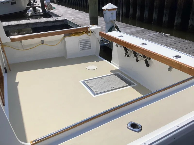 Slide: The Image of Spacious deck of 2021 Willis Beal 35 Extended Pilothouse at dock. - 13