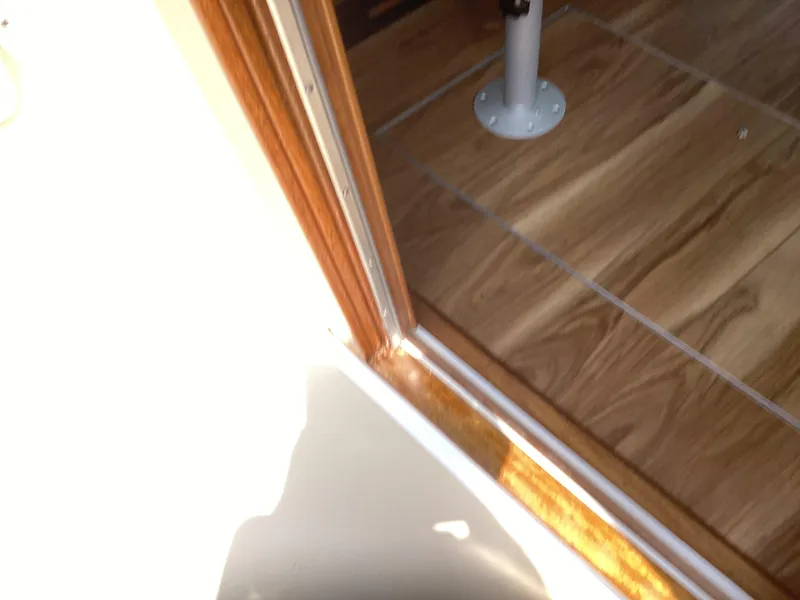 Slide: The Image of Interior view of 2021 Willis Beal 35 Extended Pilothouse with wooden flooring. - 16