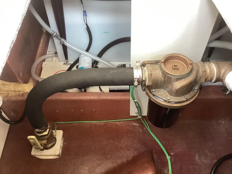 Slide: The Image of Engine compartment of 2021 Willis Beal 35 Extended Pilothouse, showing hoses and fittings. - 38