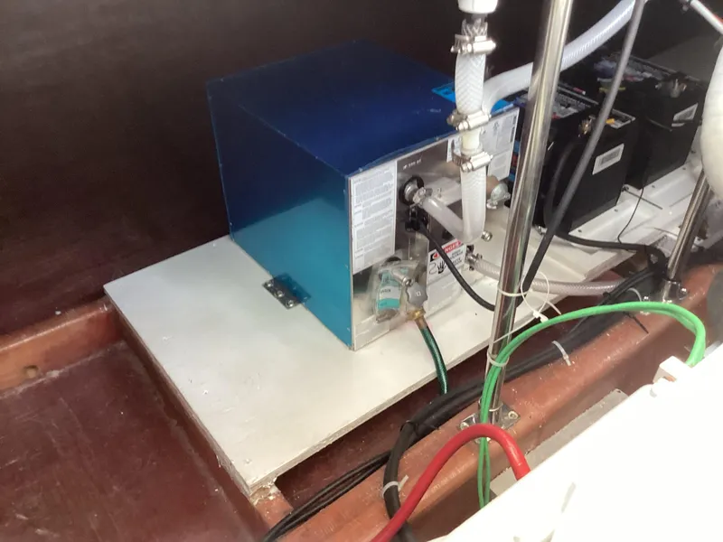 Slide: The Image of Engine compartment of 2021 Willis Beal 35 Extended Pilothouse with mechanical components. - 40