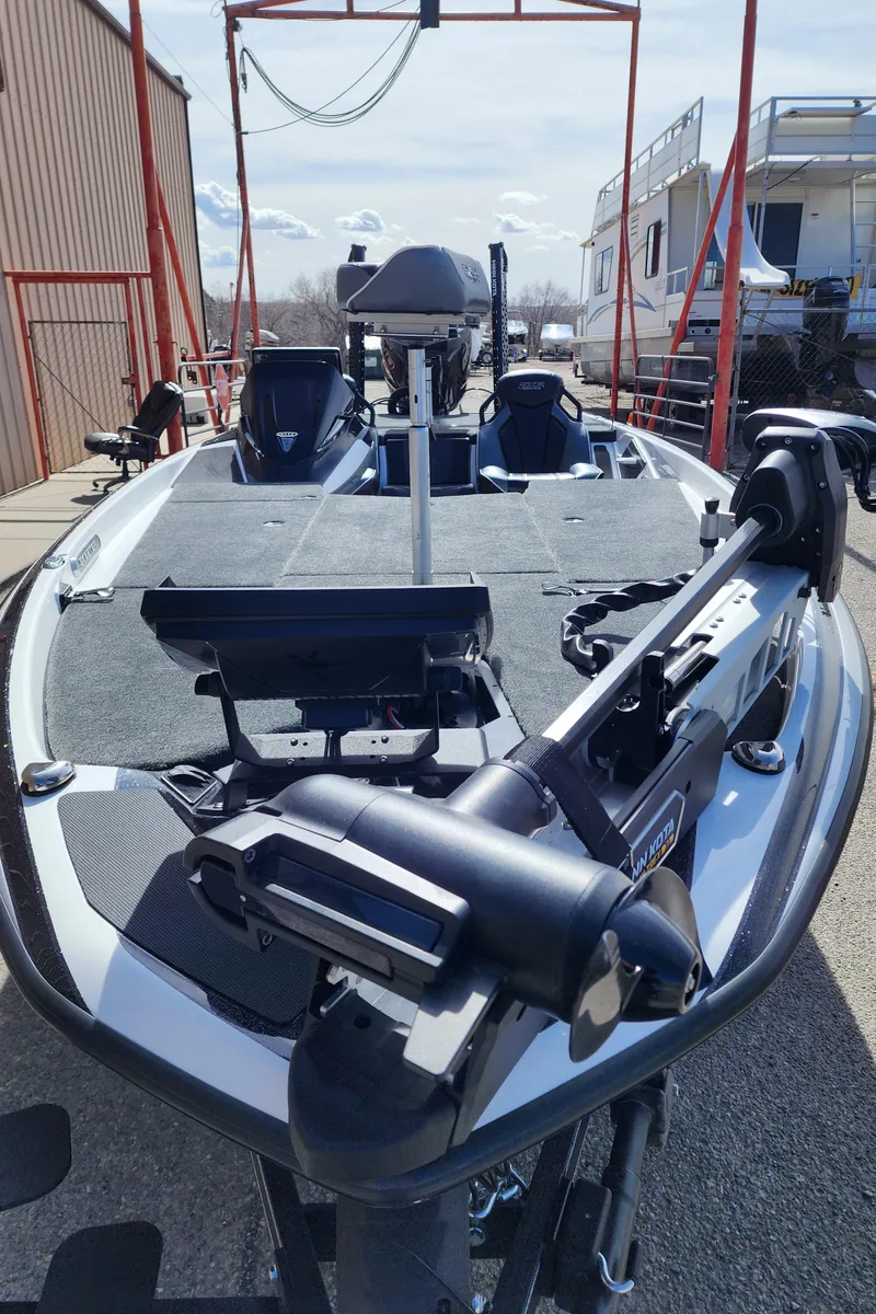 Slide: The Image of 2024 Skeeter FXR 20 Limited fishing boat with advanced equipment and spacious deck. - 10