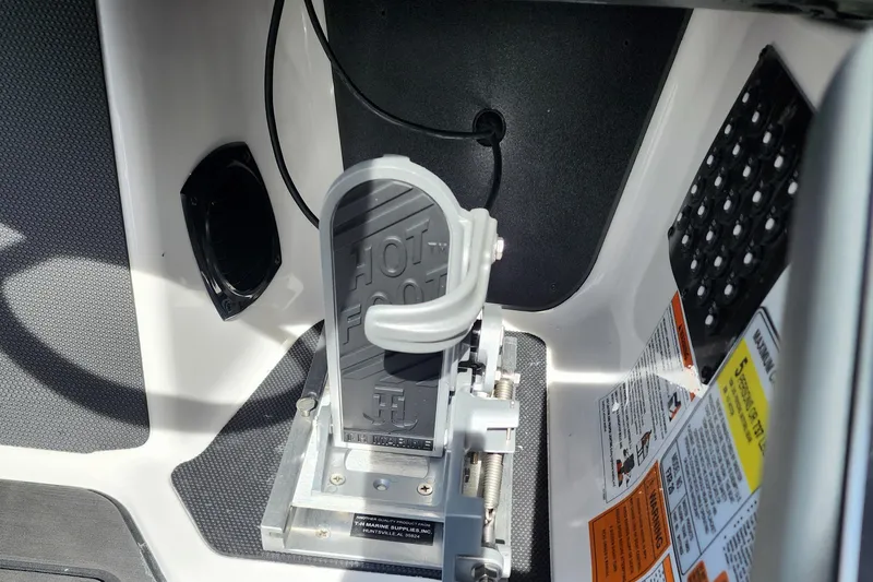 Slide: The Image of 2024 Skeeter FXR 20 Limited boat foot pedal with safety instructions. - 14