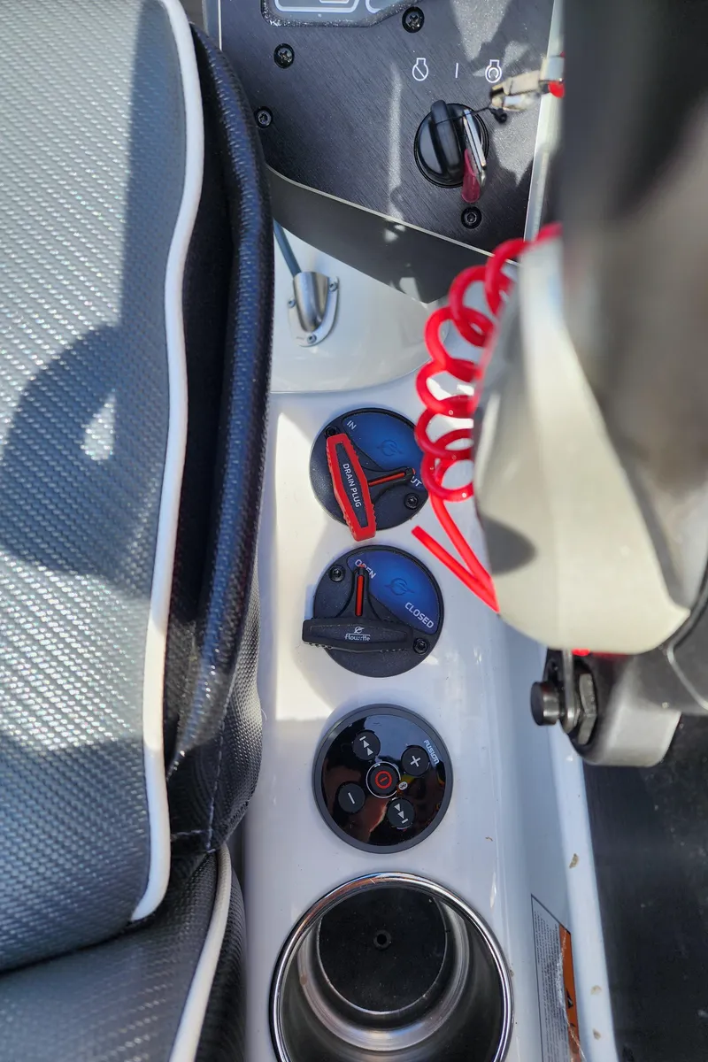 Slide: The Image of 2024 Skeeter FXR 20 Limited boat console with controls and red safety cord. - 15