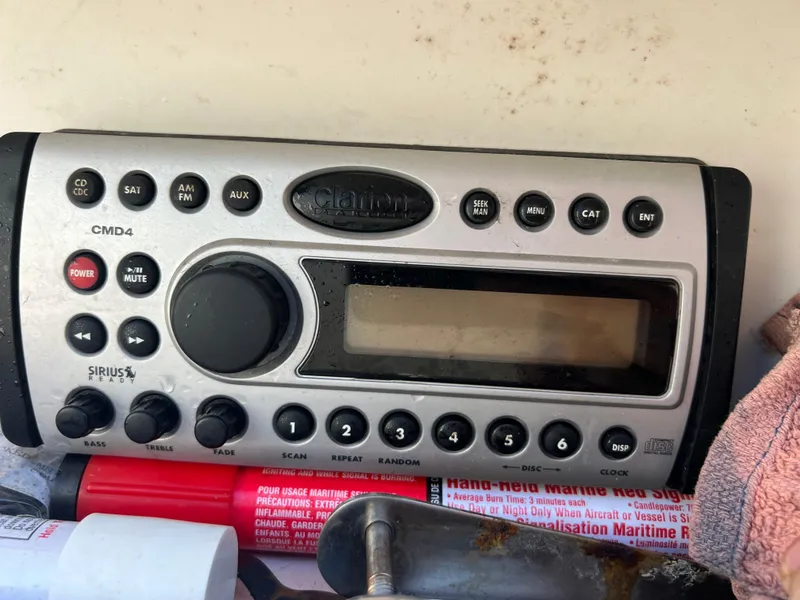 Slide: The Image of Clarion CMD4 stereo system on 2006 Sea Ray 240 Sundeck boat. - 21