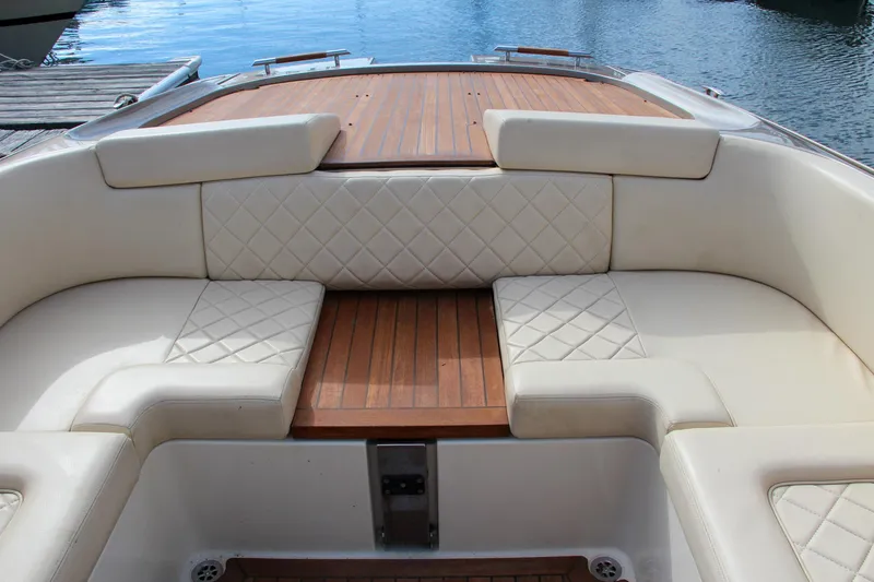 Slide: The Image of Luxurious seating on 2017 Chris-Craft Corsair 32 boat with quilted upholstery. - 35