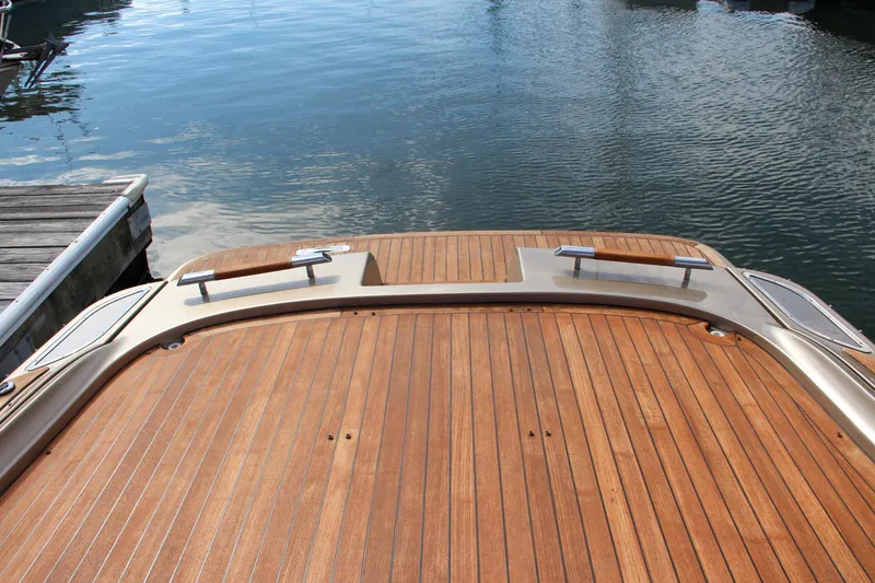 Slide: The Image of 2017 Chris-Craft Corsair 32 teak deck at marina. - 36