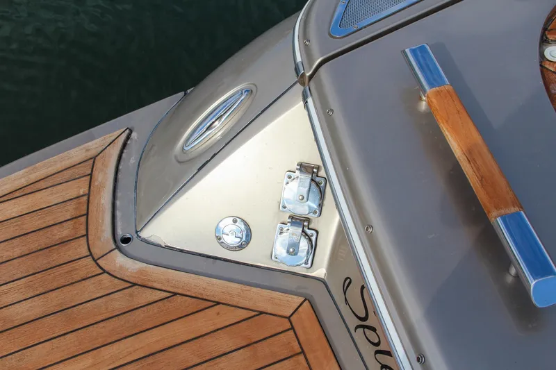 Slide: The Image of 2017 Chris-Craft Corsair 32 boat deck with wood and metal details. - 37