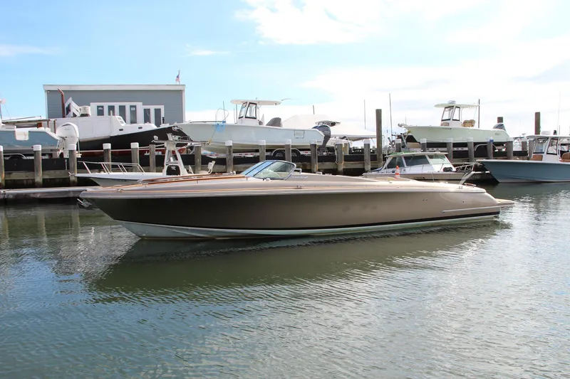 Slide: The Image of 2017 Chris-Craft Corsair 32 luxury boat docked in marina. - 42