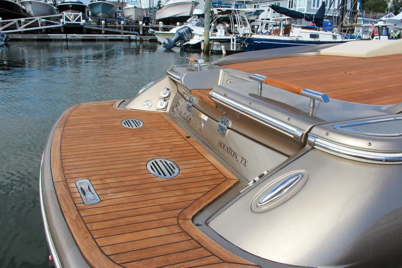 Slide: The Image of 2017 Chris-Craft Corsair 32 boat with teak deck at marina. - 6