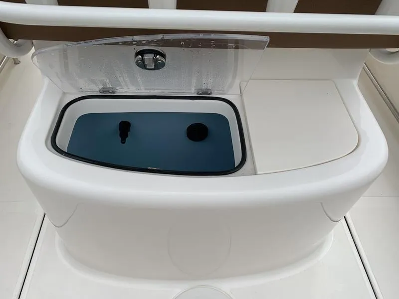 Slide: The Image of Livewell compartment on 2025 Pioneer SPORTFISH 222 boat. - 11