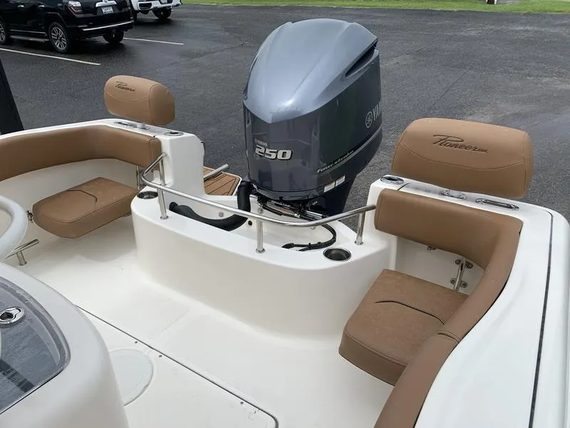 Slide: The Image of 2025 Pioneer SPORTFISH 222 boat with Yamaha 250 engine and tan seating. - 8